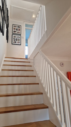 staircase upstairs stairs painted white
